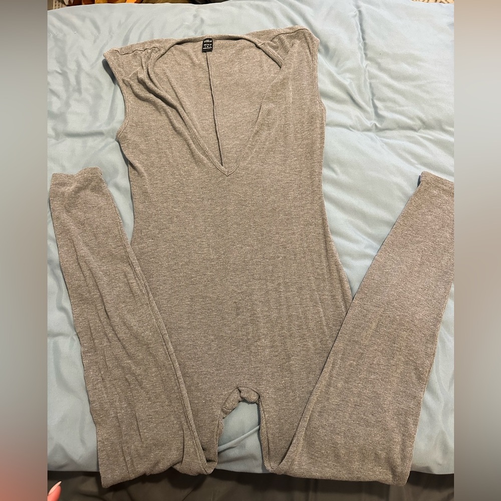 Light grey deep cut jumpsuit